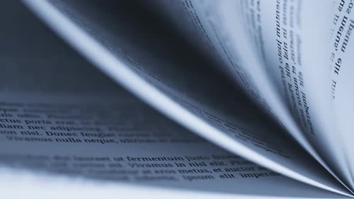 Loop of book turning pages symbolizing education, learning, wisdom or knowledge.