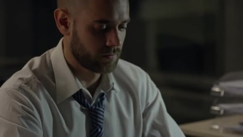 Young Adult Working on Laptop at Night