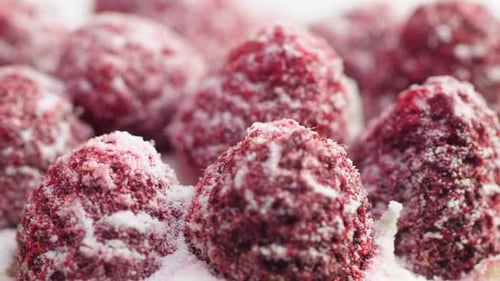 Close Up of Delicious Raspberries Covered in Powdered Sugar