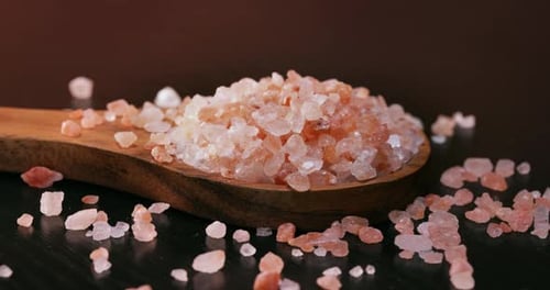 Pink Himalayan Salt on a Wooden Spoon