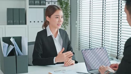 Asian beautiful woman talk with hr manager for job interview in office.