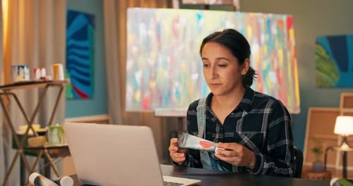 Portrait of Art Store Employee Doing Through Computer Laptop Live with Store Customers Woman Showing