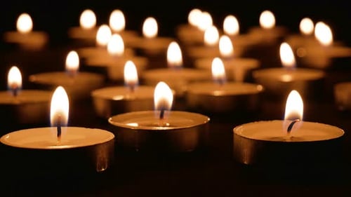 Candles Burning In Dark Room