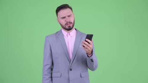 Man Disappointed with Content on Cellphone