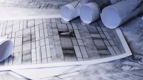 Hintergrund mit architektonischen Zeichnungen. Blätter mit Skizzen von Gebäuden.