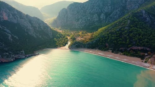 Aerial View of Sea Bay Coastline and Mountains