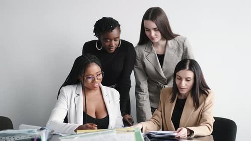 Business Multi Racial Women Working in the Office