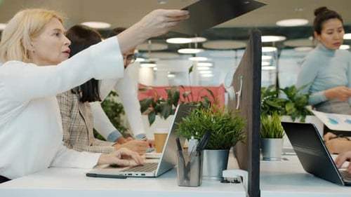 Diverse Team Working Together in Modern Office