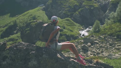 Woman Backpacker Hiking In Mountain 045