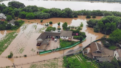 People Who Are in a Flooded House By a River That Overflowed After Rain Floods. Ecological