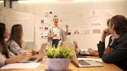 Meeting of multiracial professional teamwork with coworkers at the business office.