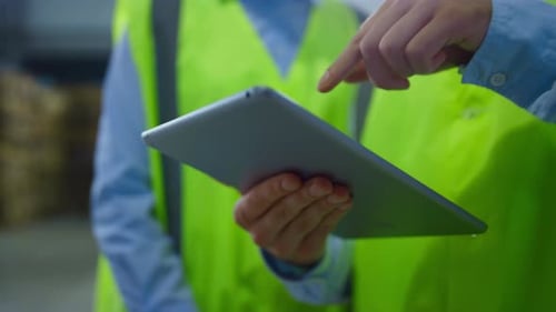 Closeup Warehouse Workers Tablet Information Checking Manufacture Inspection