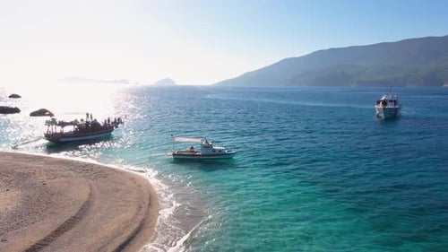 Boats with Tourists on Sea Bay