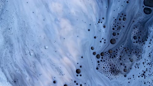 Abstract Acrylic Paint Spread Blast Explode Galaxy. Bright colored bubbles sparkling.