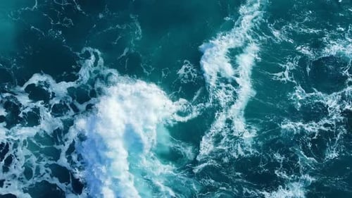 Pure Blue Ocean Water Waves with Light Reflections at Slow Motion Powerful Storm on the Sea