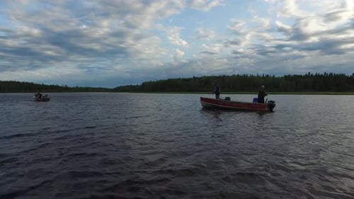 Boats with fishermen on a lake