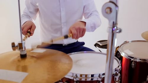 A Happy Man Drummer From the Musical Band Playing Song in the Studio - Hitting the Hi-hats