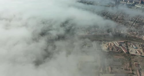 Aerial View. Scenic Aerial View Through Moving White Clouds. Fog