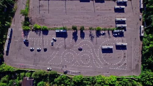Top Down Wide Aerial View of Drivers Practicing