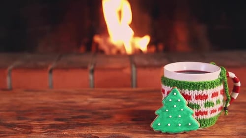 Cozy Fireplace Scene with Christmas Cookie and Drink