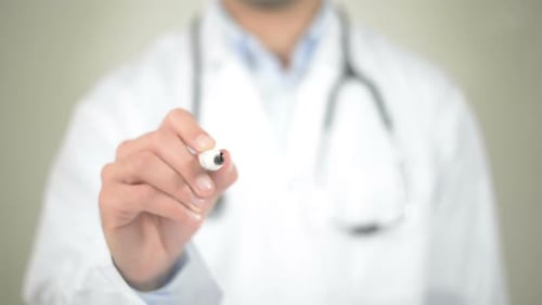 Doctor Writing 'Anexity' with Marker