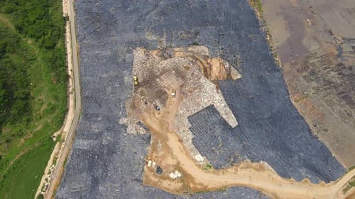 Aerial Top View Video of a Solid Waste Landfill. City Waste Treatment Location. Environmental