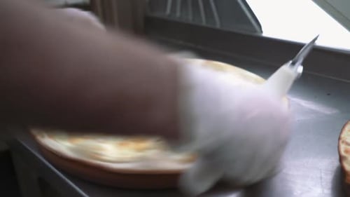 Cutting Cheese Pizza with Roller Cutter