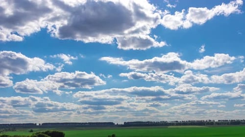 Clouds Over Green Fields