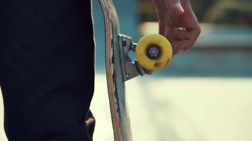 Skateboard Close Up at Skatepark with Yellow Wheels