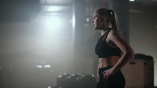 Fitness Healthy Woman Tired After Strength Training Exercise at Gym Resting Relaxing After Intense