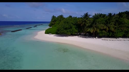 Aerial view landscape of tranquil sea view beach time by aqua blue lagoon with white sandy backgroun