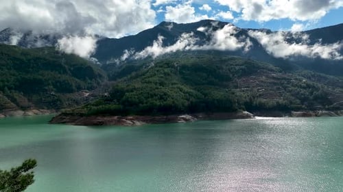 Clouds in the mountains above the river aerial view Turkey Alanya 4 K