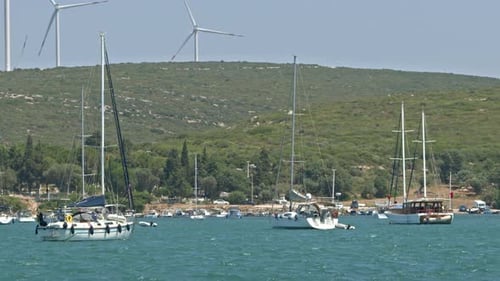 Recreational Boats And Electric Wind Tribunes In The Marina 3