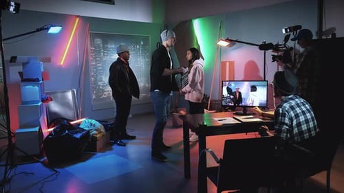 Film Crew Shooting a Scene in Studio