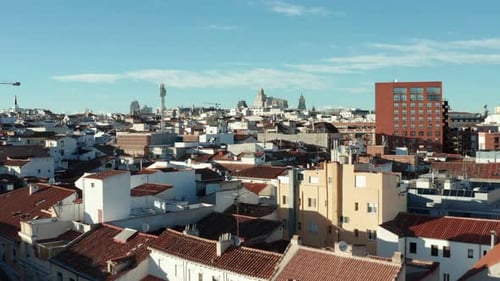 Forwards Fly Above Building Roofs