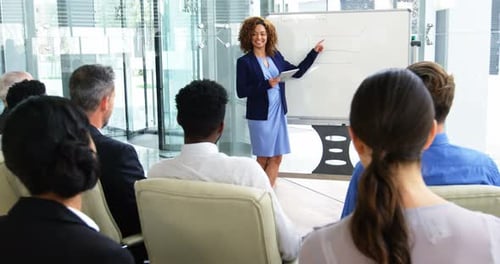 Business Meeting Presentation With Raised Hands