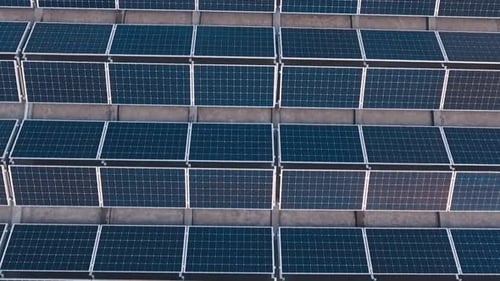 Roof mounted solar power plant. Top down vuew of photovoltaic power plant on roof