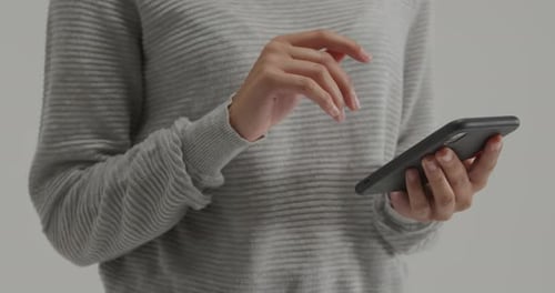 Hands Using a Mobile Smartphone Device