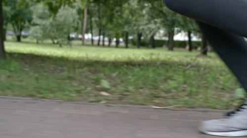 Close Up of Feet of Running Woman