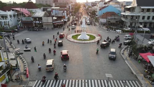 Aerial view of Tugu Yogyakarta Landmark with busy traffic.