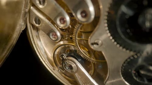 Intricate Gears of a Vintage Pocket Watch