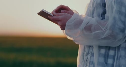Agriculture Scientist Researcher Using Digital Tablet Outdoors