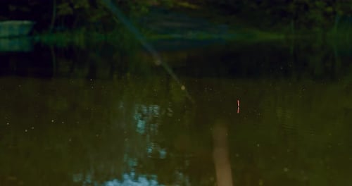 Unsuccessful Hooking By Rod in Beautiful Lake Float on Water Closeup View Prores