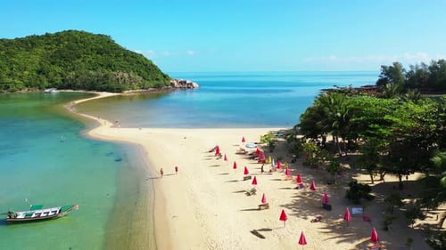 Luxury drone island view of a white sandy paradise beach and aqua blue ocean background in colorful