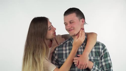 Affectionate Couple Posing Together in a Studio