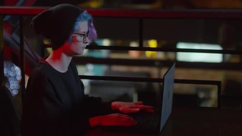 Female Hacker Programming in Café