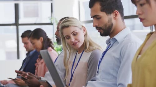 Business people attending to a meeting in conference room
