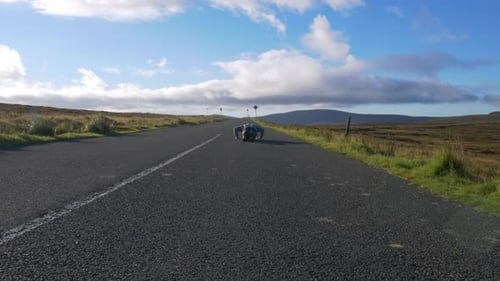 Athletic Man Runs And Does The Pushup On The Road In Wicklow Mountains, Ireland. Fit And Healthy Lif