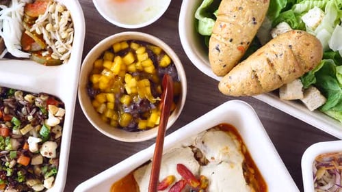 Variety of Colorful Food in Disposable Containers