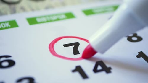 Save the Date written on a calendar 7